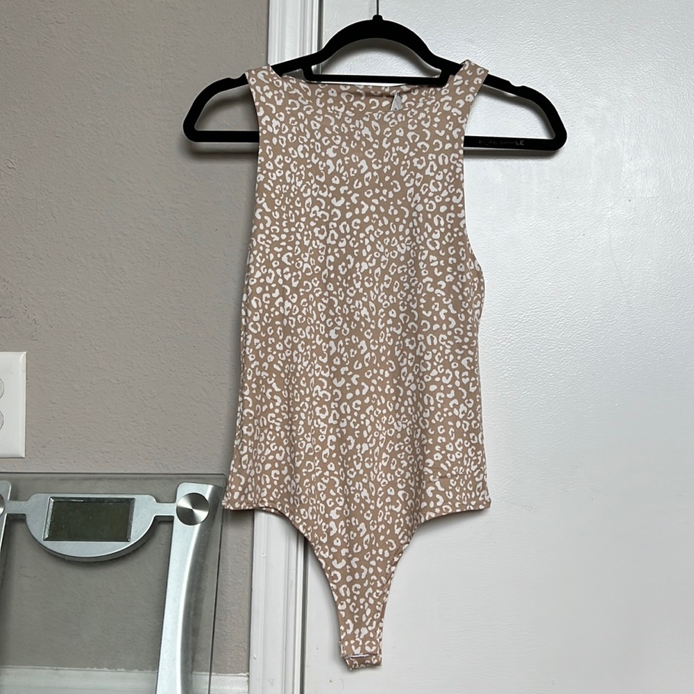 NEW WITH TAGS cheetah bodysuit